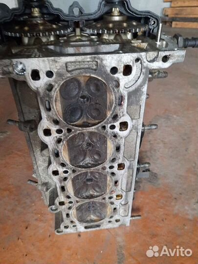 Головка блока опель коса с 1.2л.2002г.в