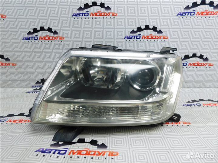 Фара левая Suzuki Escudo TDA4W-201246 J24B 2009