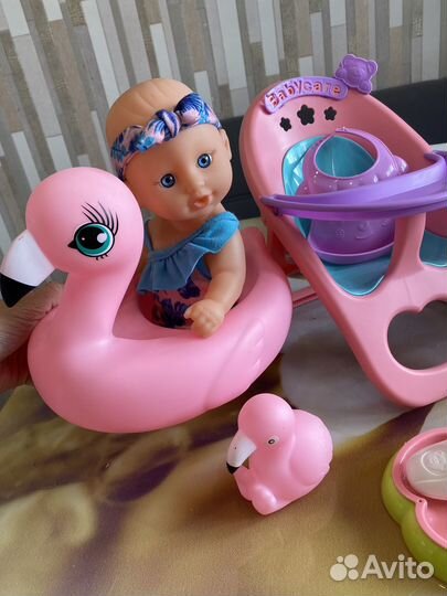 Пупсик со стульчиком для кормления и фламинго