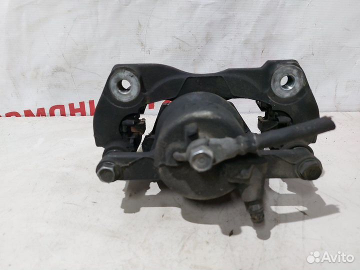 Суппорт тормозной передний левый Toyota Corolla