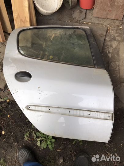 Дверь peugeot 206