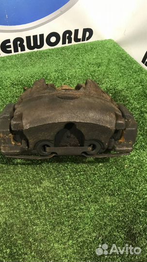 Суппорт тормозной передний левый Jaguar XF