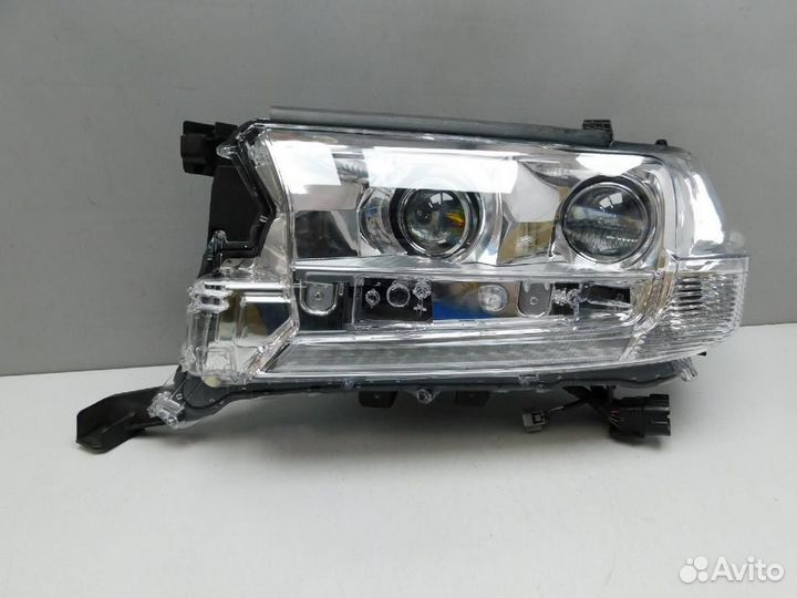 Фара левая Toyota Land Cruiser