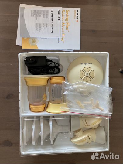 Молокоотсос medela swing maxi flex