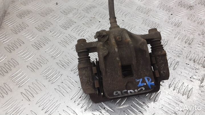 Суппорт задний правый Kia Magentis рест. 2004