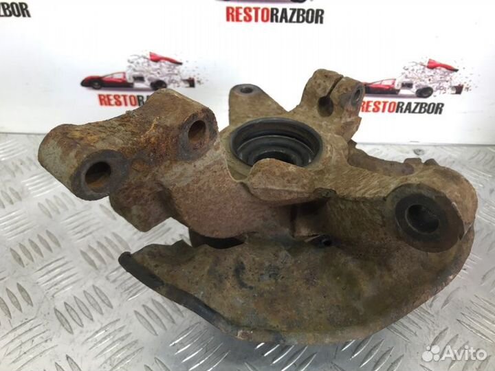 Кулак поворотный левый Kia Spectra седан S6D 2007