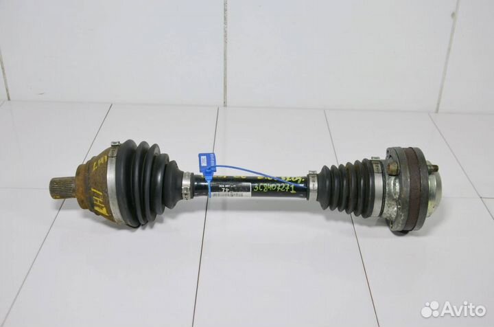 Приводной вал передний левый Volkswagen Passat