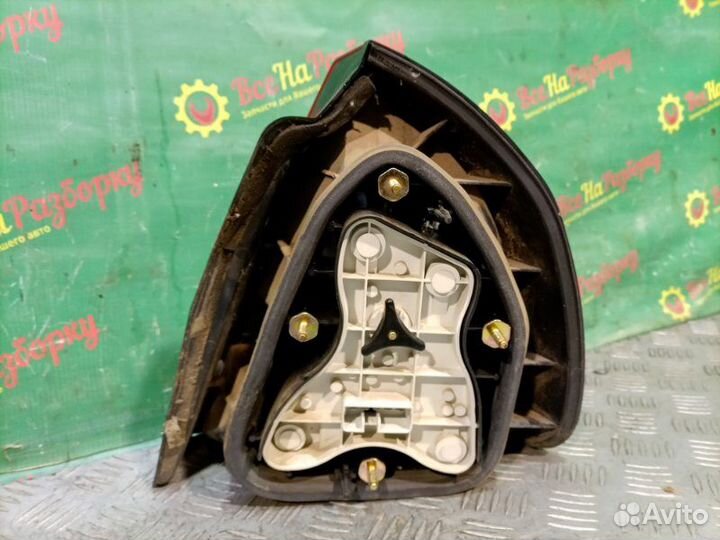 Фонарь задний левый Mitsubishi Carisma лифтбек 1.6