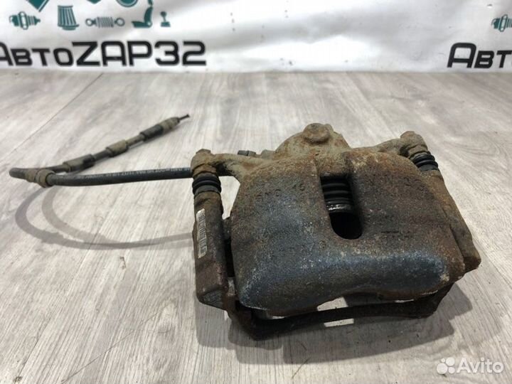 Суппорт тормозной передний правый Skoda Octavia A7