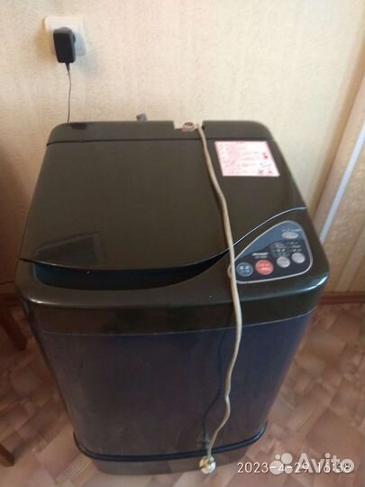 Стиральная машинка с вертикальной загрузкой