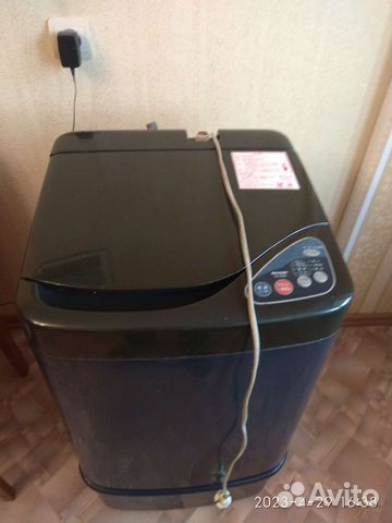 Стиральная машинка с вертикальной загрузкой