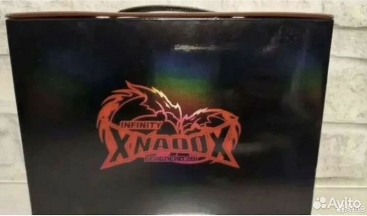 Два больших металлических волчка с запуском