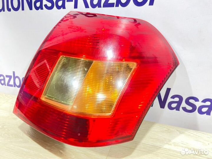 Фонарь левый Toyota Corolla E120 1.4 4ZZ 2001-2007