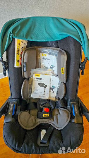 Коляска-автокресло Doona с базой
