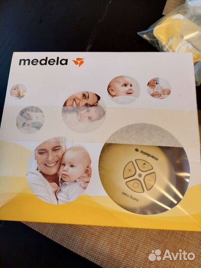 Молокоотсос электрический medela swing maxi