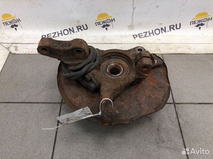 Кулак поворотный передний левый Mitsubishi Lancer