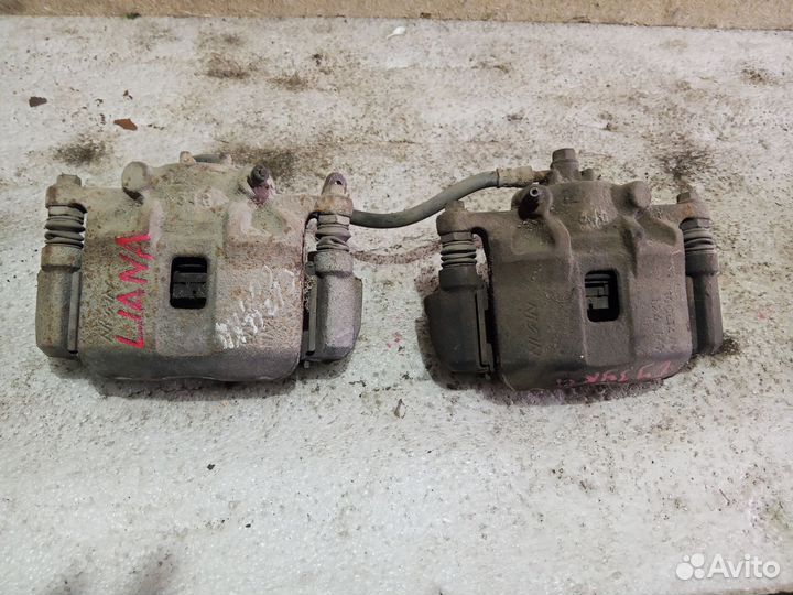 Суппорта передние Suzuki Liana 1.6