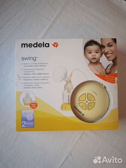 Молокоотсос medela swing электрический