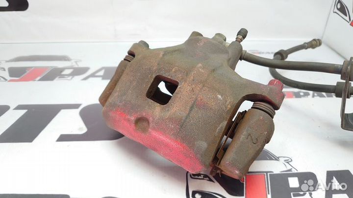 Суппорт тормозной передний Mitsubishi Lancer X (20