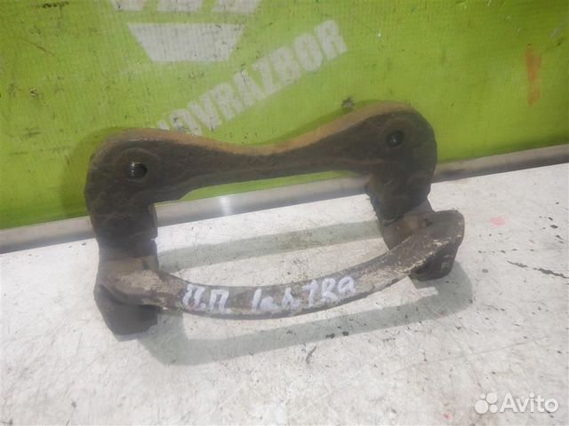 Скоба суппорта переднего Хендай Лантра 96-00