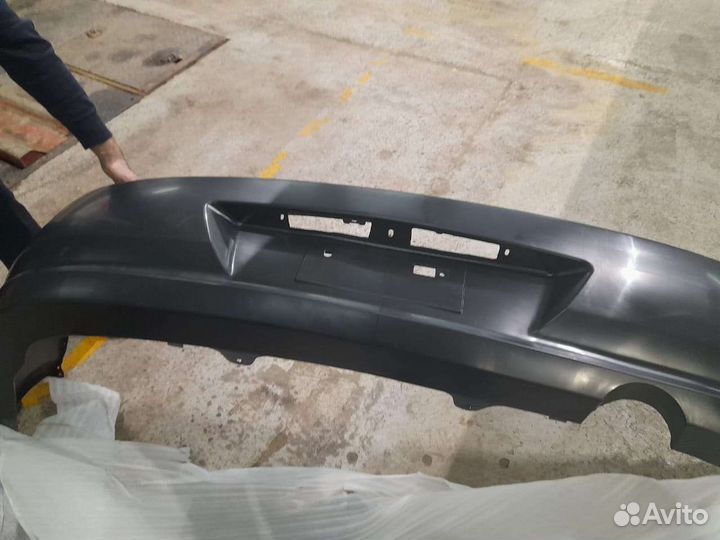 Задний бампер nissan almera classic 2012