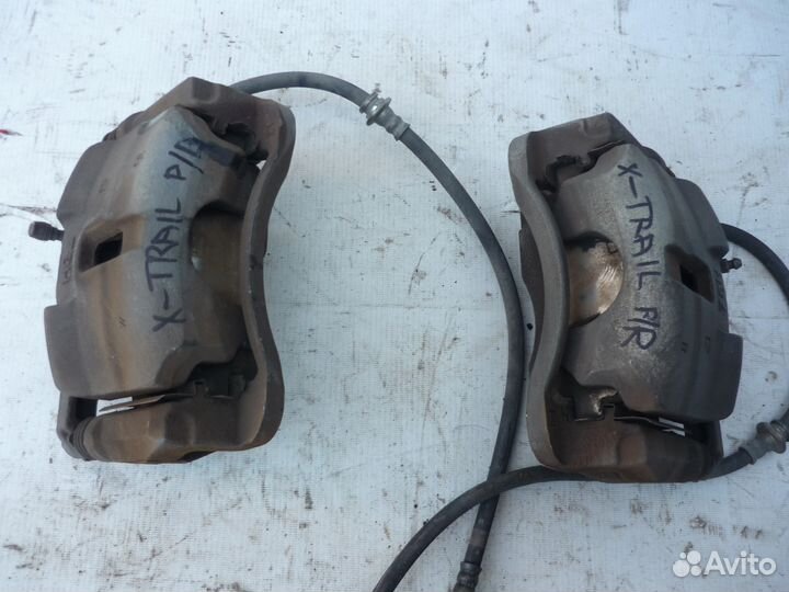 Суппорта тормозные передние Nissan X-Trail, T31