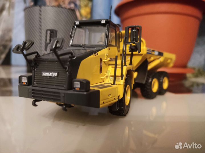 Сочлененный самосвал komatsu 250