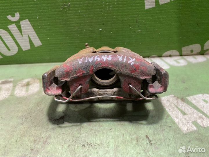 Суппорт тормозной передний правый Kia Shuma