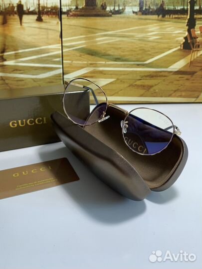 Солнцезащитные очки Gucci