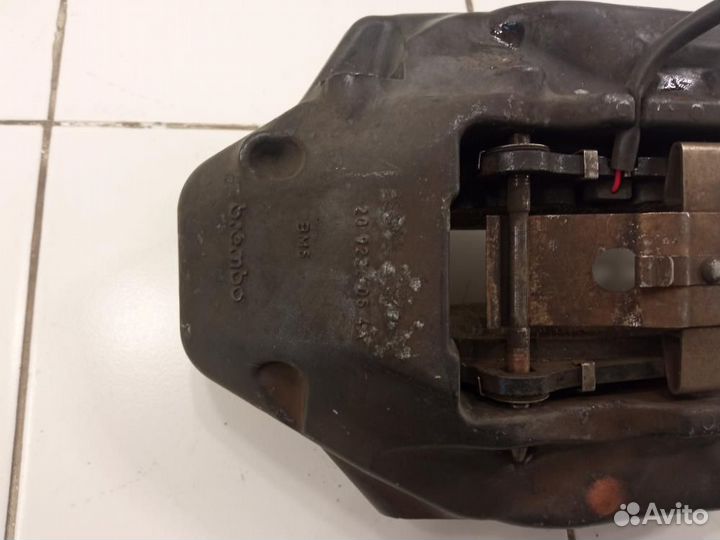 Суппорт передний левый Volkswagen Touareg II (2010—2014)