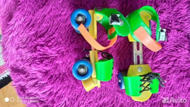 Роликовые коньки