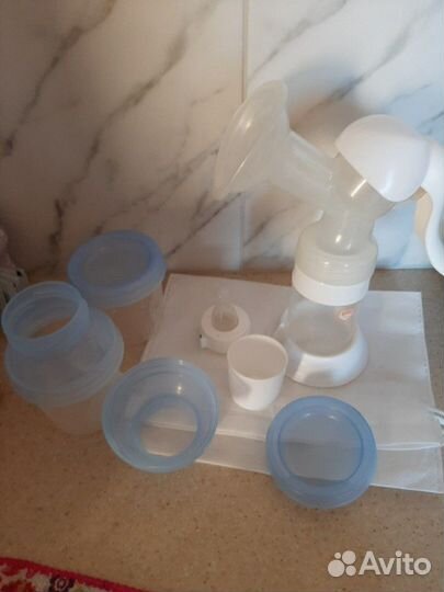 Молокоотсос Conpol ручной. контейнеры Авент в пода