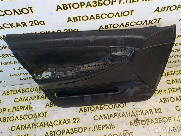 Обшивка двери передней левой Toyota Corolla (E120