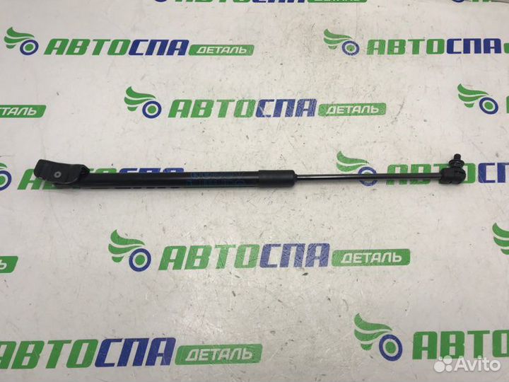 Амортизатор крышки багажника задний левый Mazda