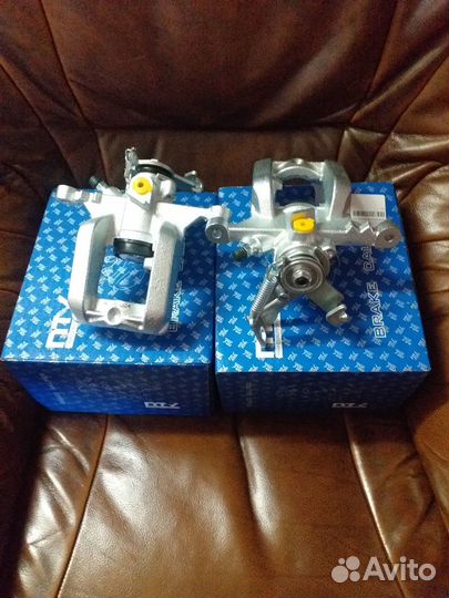 Суппорт задний Opel Astra J