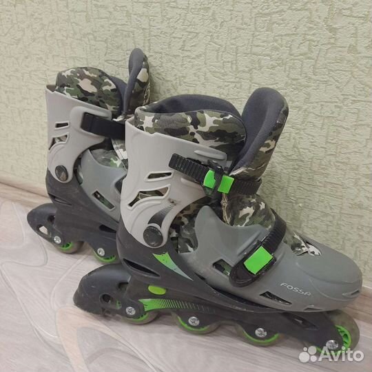 Роликовые коньки