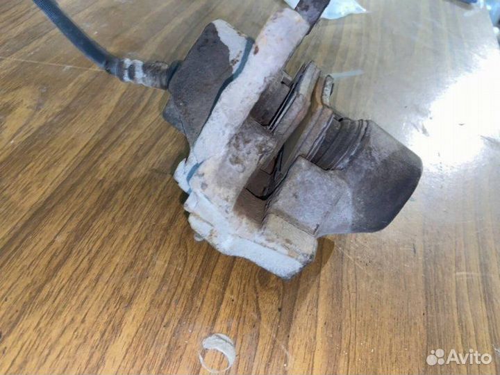 Суппорт тормозной задний левый Mercedes-Benz