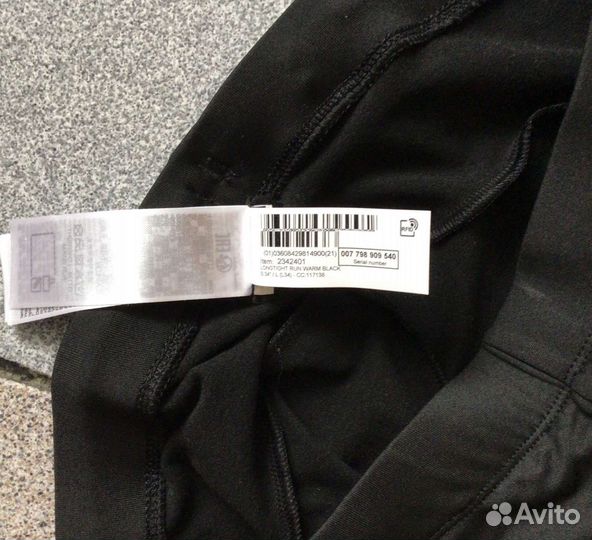 Тайтсы мужские черные RUN warm Kalenji