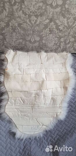 Меховая подстилка в коляску