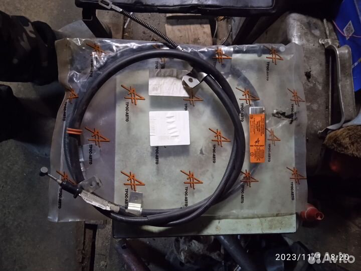 Трос ручного тормоза Шевроле Ланос