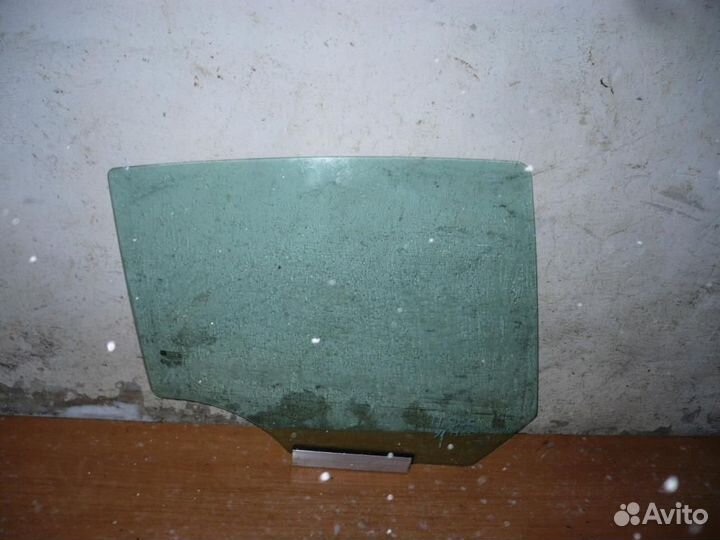 Стекло двери задней правой Opel Astra H