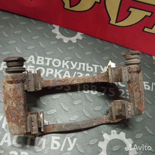 Скоба переднего правого суппорта Geely Emgrand EC7