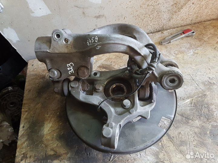 Поворотный кулак передний левый Opel Astra J GTC