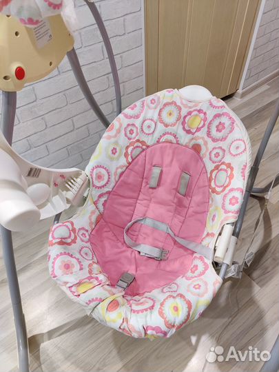 Электрокачели Graco с музыкой и столиком