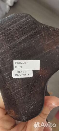 Статуэтка асмат-виолончелист