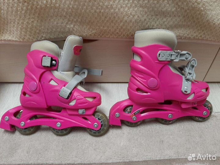 Роликовые коньки