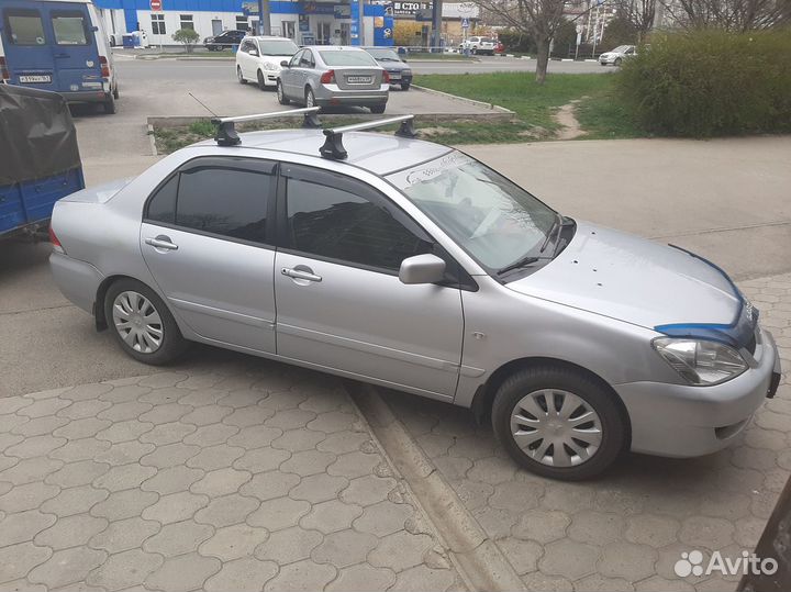 Багажник на крышу Mitsubishi Lancer 9, штатный