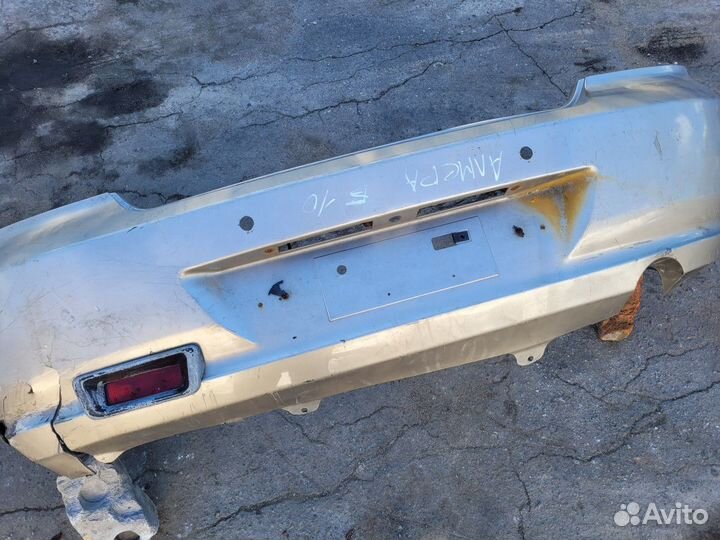 Бампер задний на Nissan Almera B10