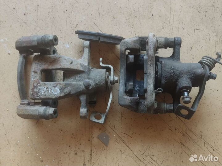 Суппорт тормозной задний Kia RIO 3 Solaris