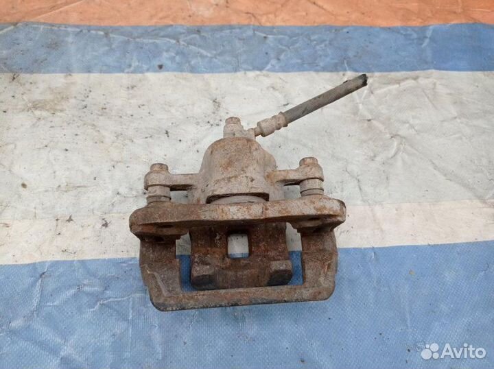 Суппорт тормозной задний правый Kia Sportаge Ii